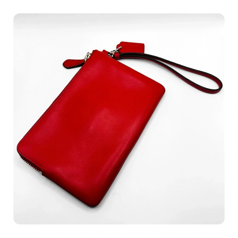 β
Coach RARE Western Rivets Wristlet - Red/Silver β
- Picture 10 of 16
